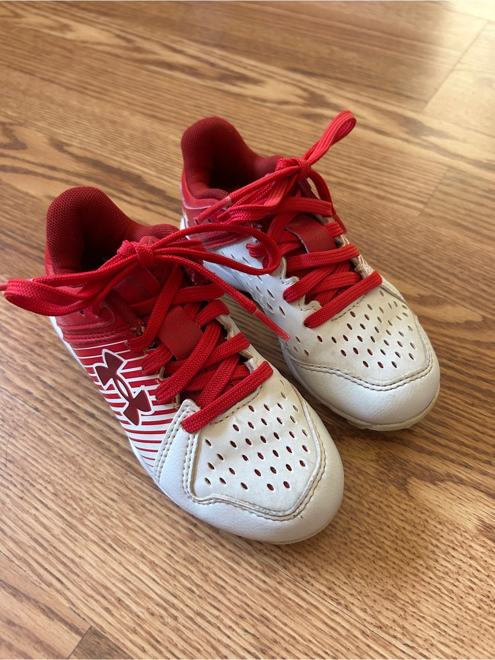 Under Armour Kids Red and White baseball cleats